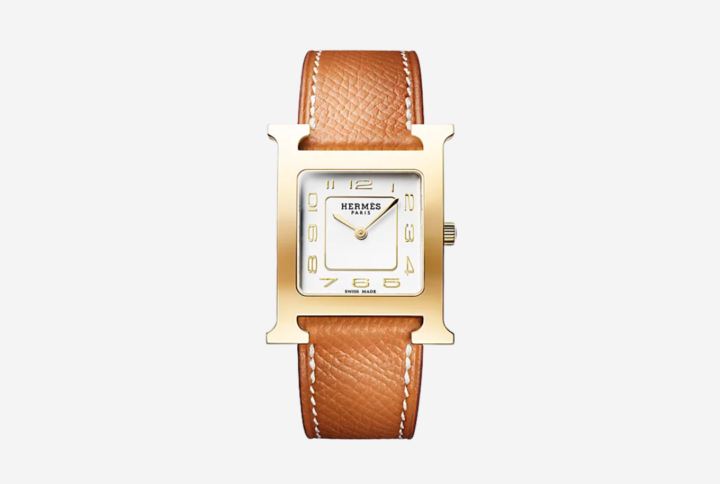hop the authentic Hermès Heure H Watch Medium Model 30mm in Gold Epsom calfskin leather. Swiss-made luxury watch with yellow gold-plated steel case & white dial
