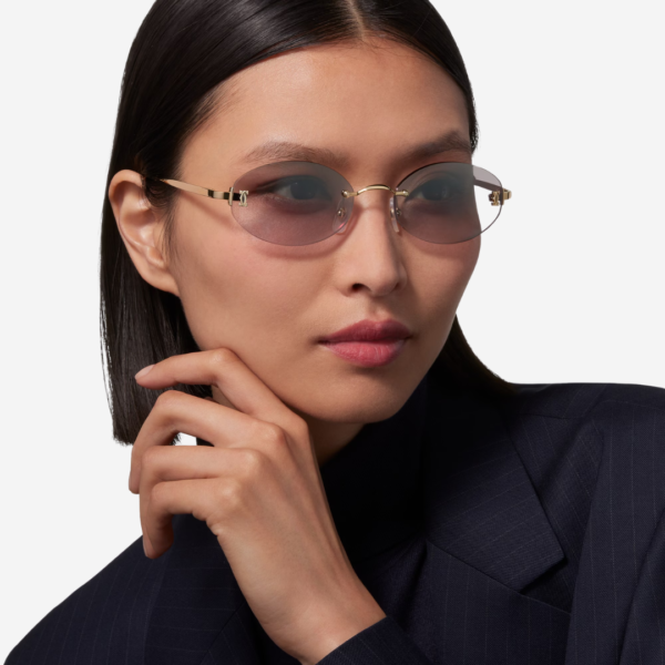 C de Cartier round sunglasses with golden metal frame and grey lenses