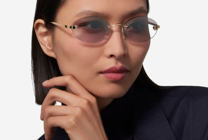 C de Cartier round sunglasses with golden metal frame and grey lenses